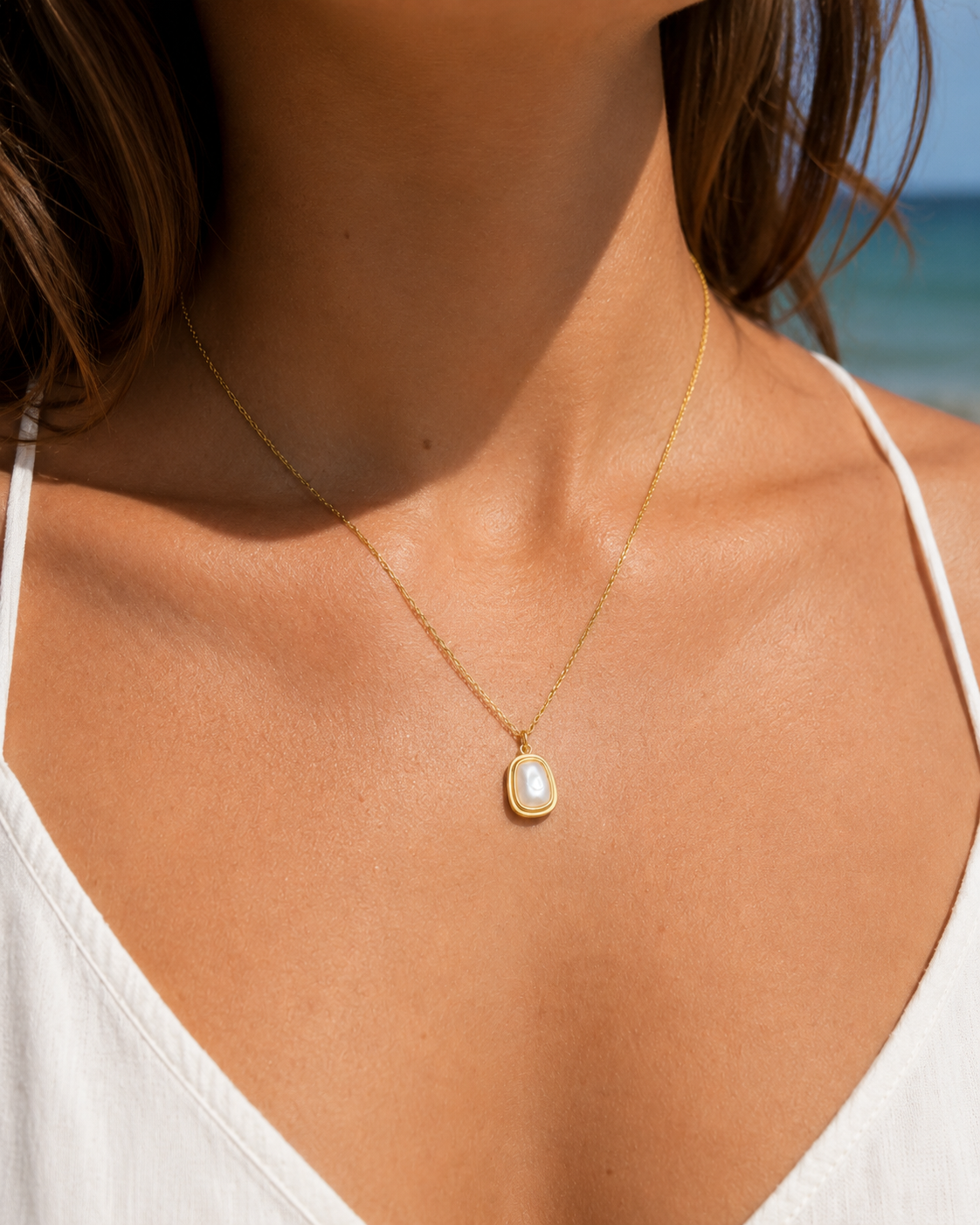 Alternate product view of Sunlit Tide Mother-of-Pearl Pendant Necklace by AURAM with luminous shell-inspired pendant