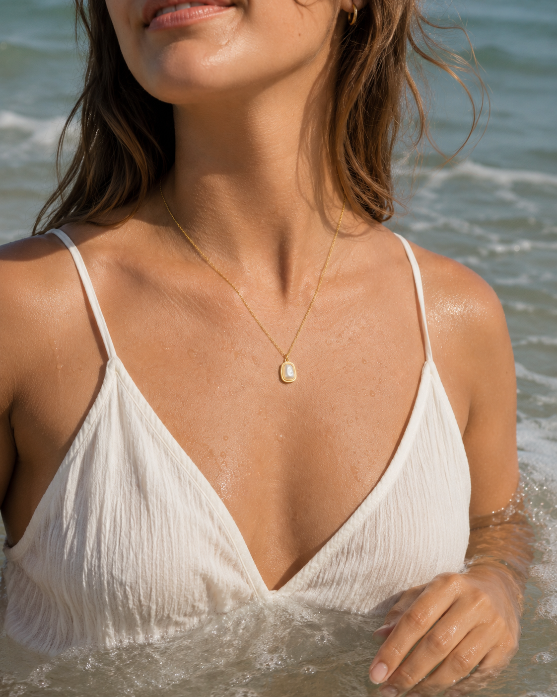 Additional view of Sunlit Tide Mother-of-Pearl Pendant Necklace by AURAM with luminous shell-inspired pendant