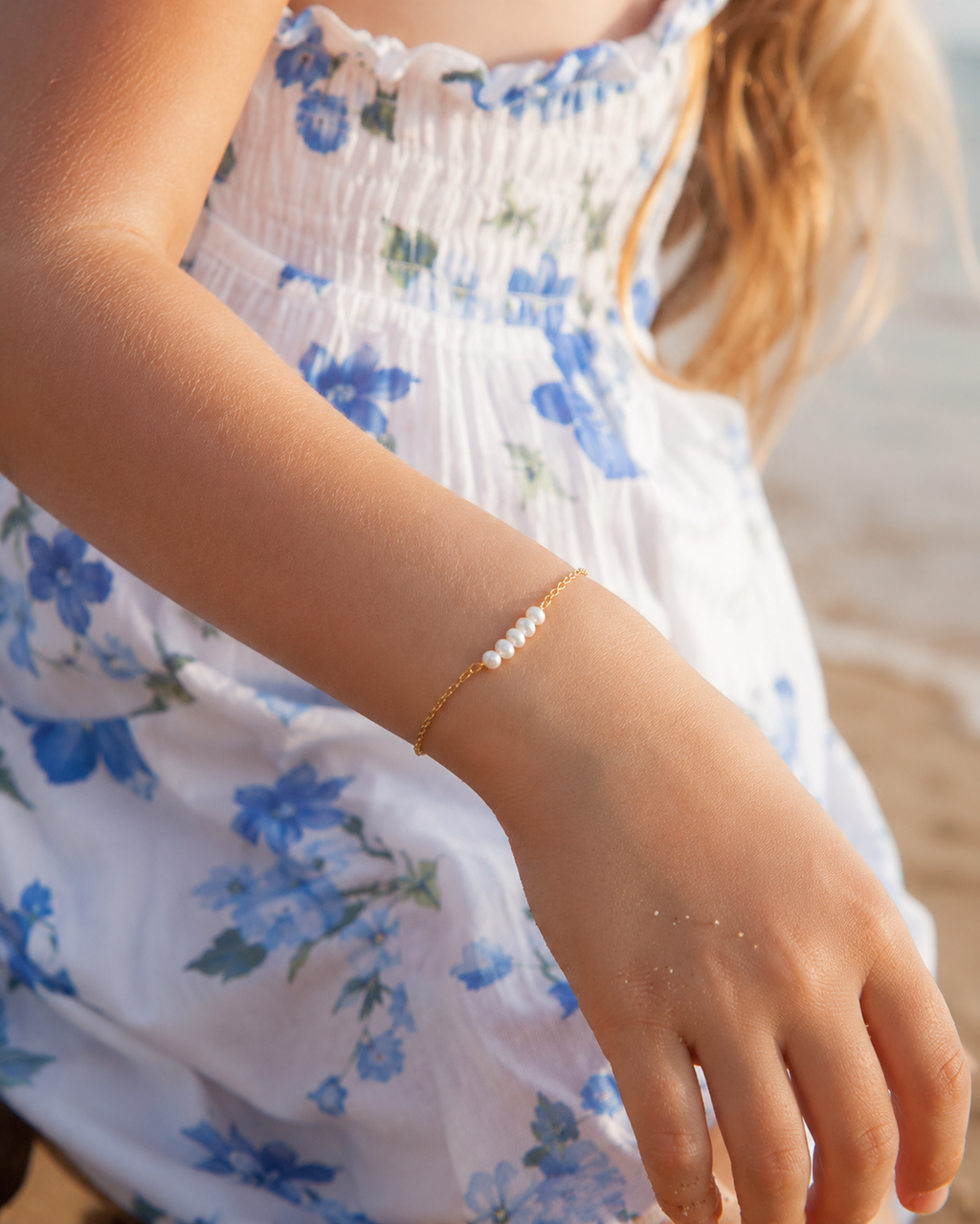Detail view of A Thread of Light Pearl Bracelet by AURAM with delicate freshwater pearl styling