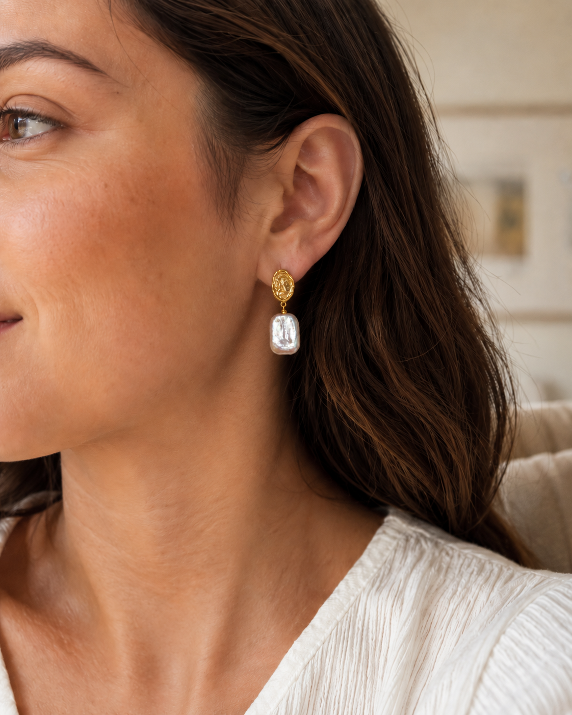 Styled view of Sunlit Relic Baroque Pearl Earrings by AURAM with organic baroque-style pearls