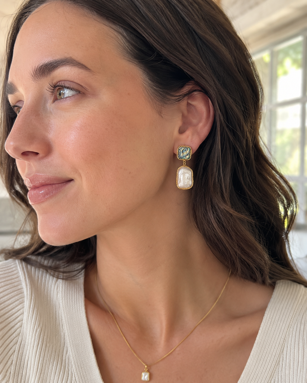 Detail view of Ocean Aura Baroque Pearl Earrings by AURAM with natural pearl glow and coastal styling