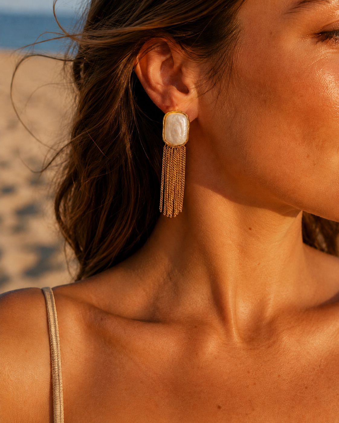 Detail view of Falling Light Baroque Pearl Tassel Earrings by AURAM with organic pearl drops