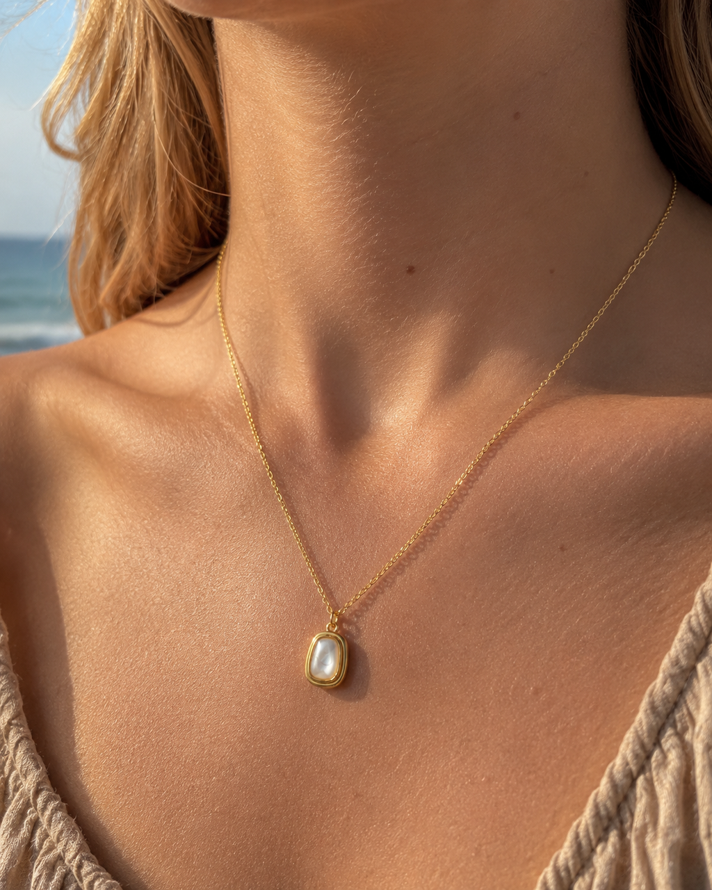 Additional view of Sunlit Tide Mother-of-Pearl Pendant Necklace by AURAM with luminous shell-inspired pendant