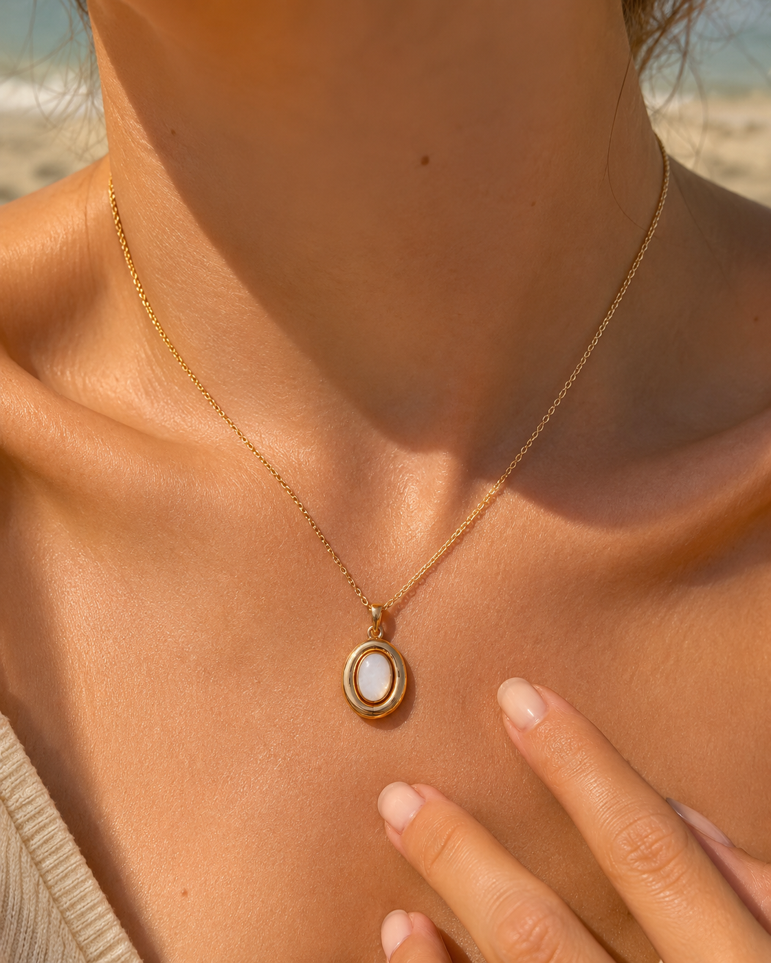 Detail view of Moon Cove Mother-of-Pearl Pendant Necklace by AURAM with moon-inspired shell pendant