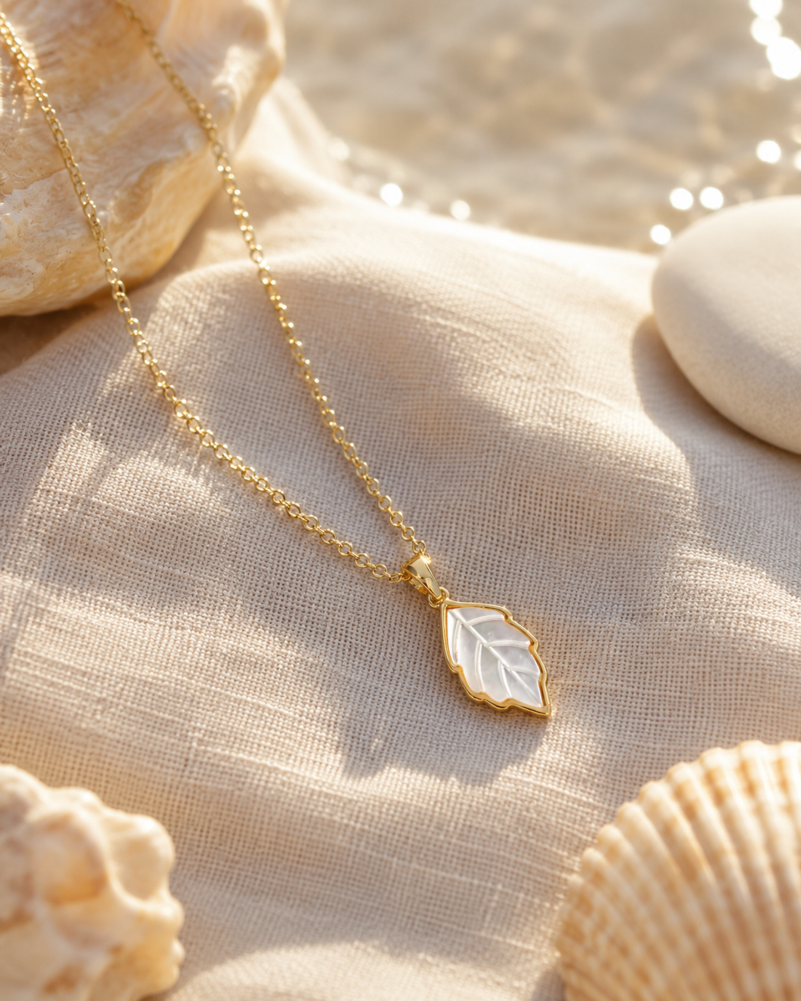 Alternate product view of Leaf Glow Mother-of-Pearl Pendant Necklace by AURAM with leaf-inspired shell pendant