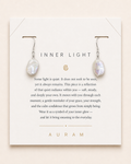 Crescent Pearl Earrings by AURAM with moon-inspired pearl styling