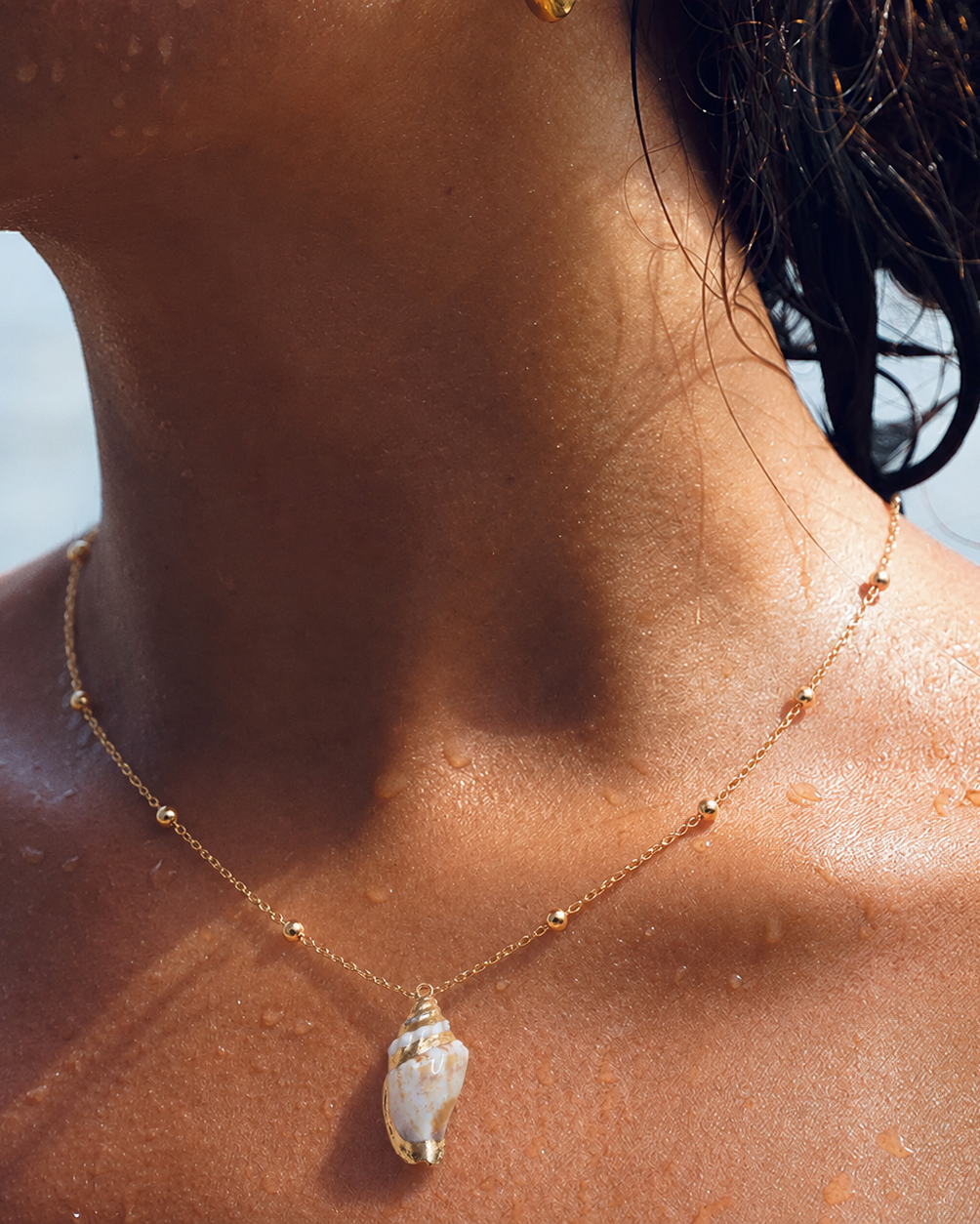Alternate product view of Sea Glow Shell Pendant Necklace by AURAM with shell-inspired coastal pendant