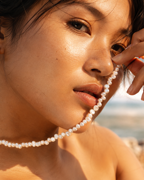 Additional view of Mini Baroque Pearl Choker by AURAM with small organic pearls for modern layering