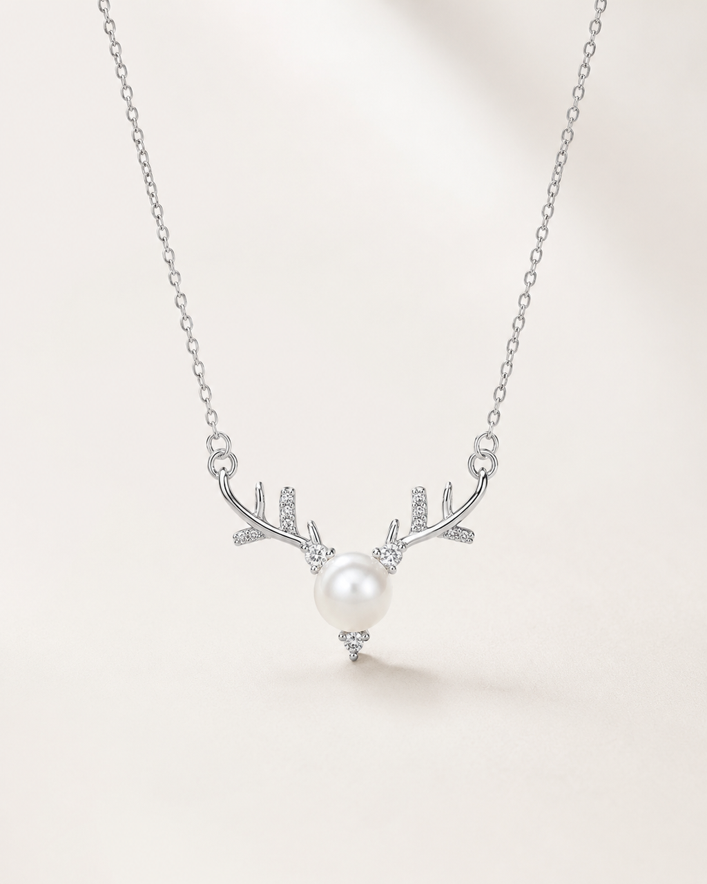 Detail view of Forest Light Pearl Necklace by AURAM with soft pearl glow and nature-inspired styling