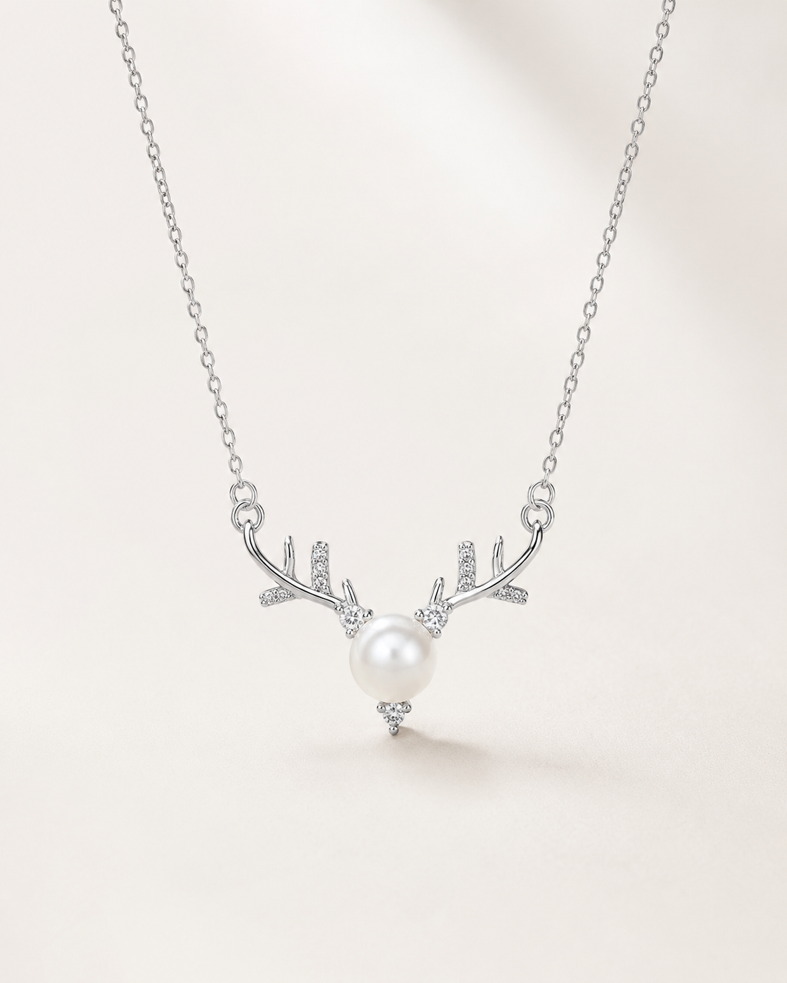 Detail view of Forest Light Pearl Necklace by AURAM with soft pearl glow and nature-inspired styling