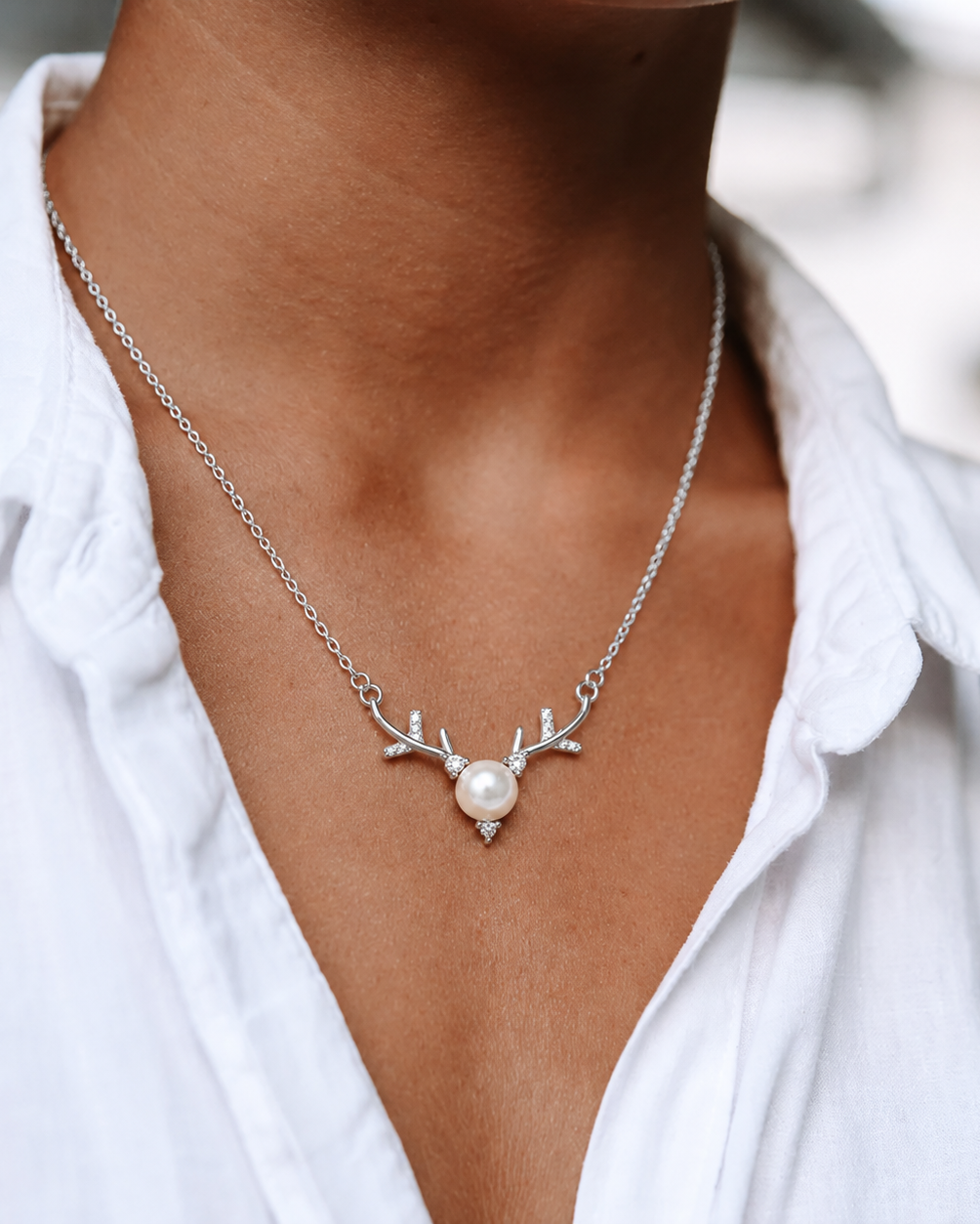 Styled view of Forest Light Pearl Necklace by AURAM with soft pearl glow and nature-inspired styling
