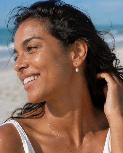 Additional view of Luna Curve Pearl Earrings by AURAM, modern pearl earrings with soft gold-tone curve styling