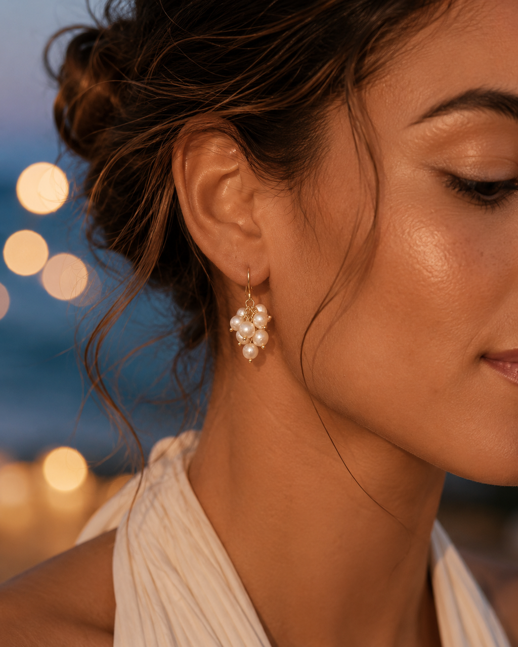Detail view of Pearl Vine Cluster Earrings by AURAM with clustered pearl and vine-inspired styling