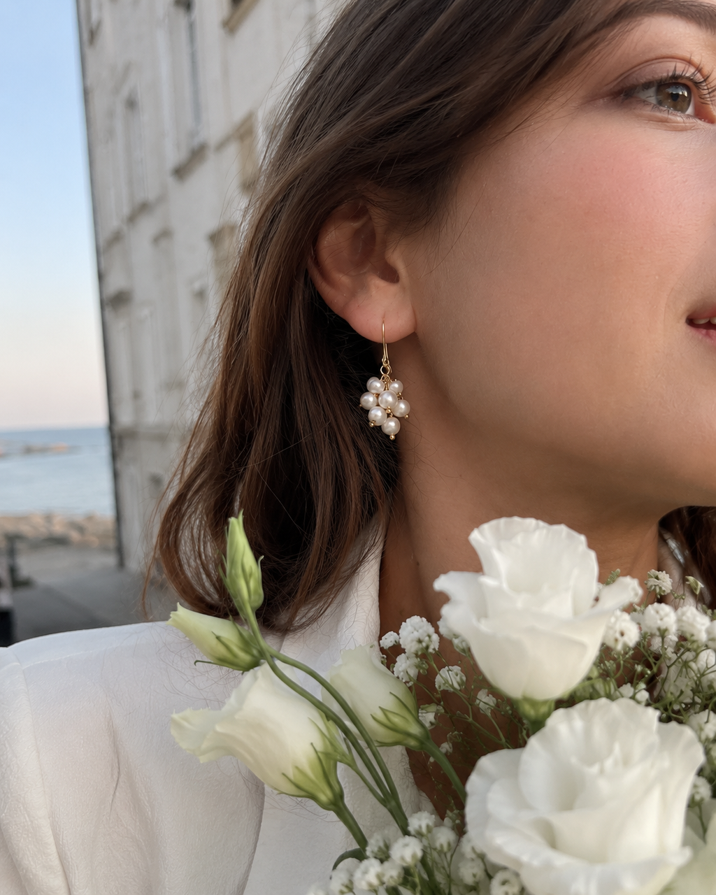 Detail view of Pearl Vine Cluster Earrings by AURAM with clustered pearl and vine-inspired styling