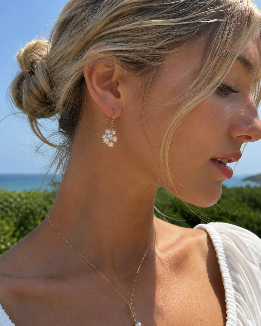 Styled view of Pearl Vine Cluster Earrings by AURAM with clustered pearl and vine-inspired styling