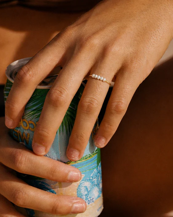 Styled view of Mini Baroque Pearl Ring by AURAM with naturally irregular pearl detail